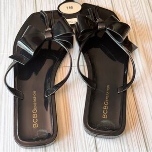 BCBGeneration Glossy Black Bow Flat Sandals Sz 7 NWT
